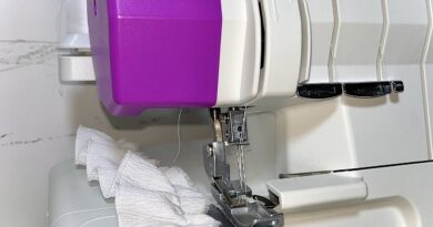  Máy vắt sổ cuốn biên gia đình